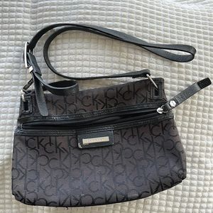 Calvin Klein crossbody purse with monogrammed print